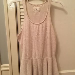 Peplum sleeveless top